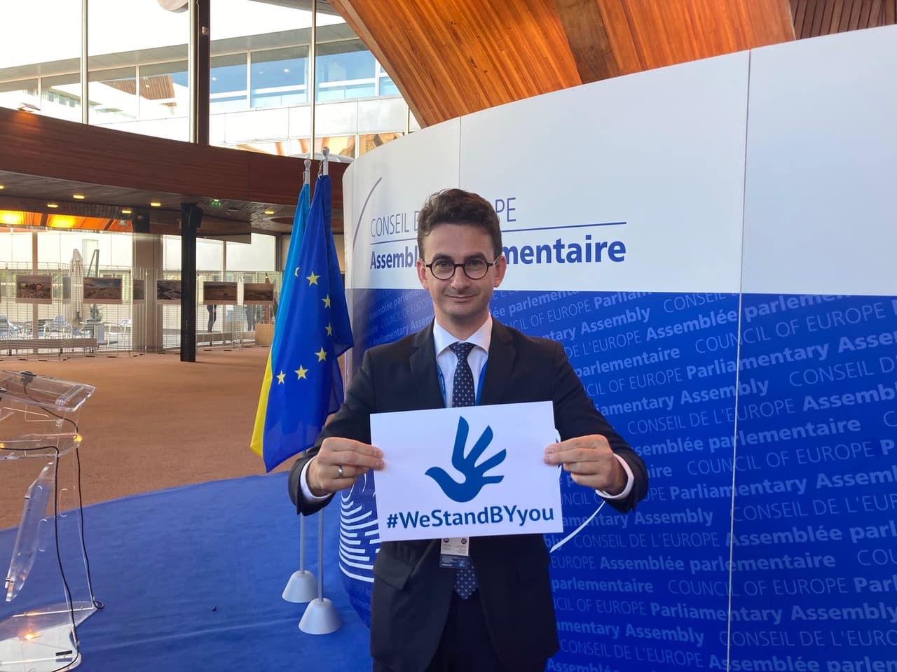 Members of the European Parliament and the Romanian Chamber of Deputies take on the godparenthood for Ihar Mints, Larysa Kuzmenka und Yauhen Barouski